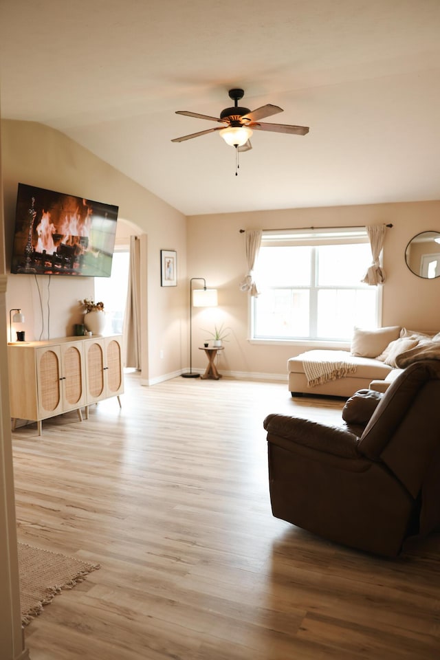 1610 Jon St, West Plains, MO 65775 - living area featuring wood finished floors, ceiling fan, healthy amount of natural light, and baseboards