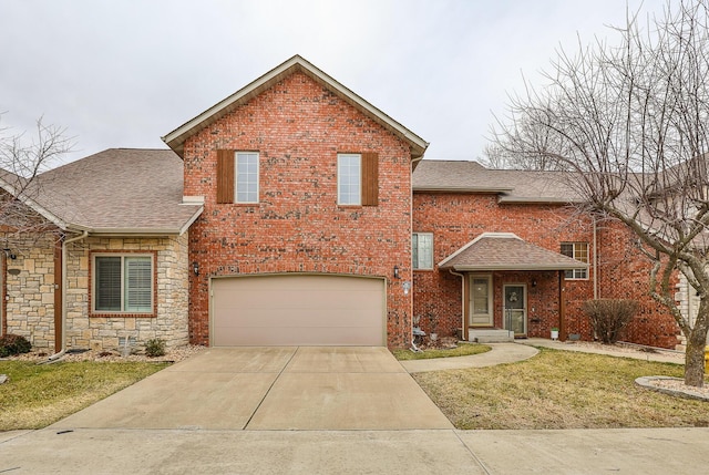 front facade featuring a garage and a front yard