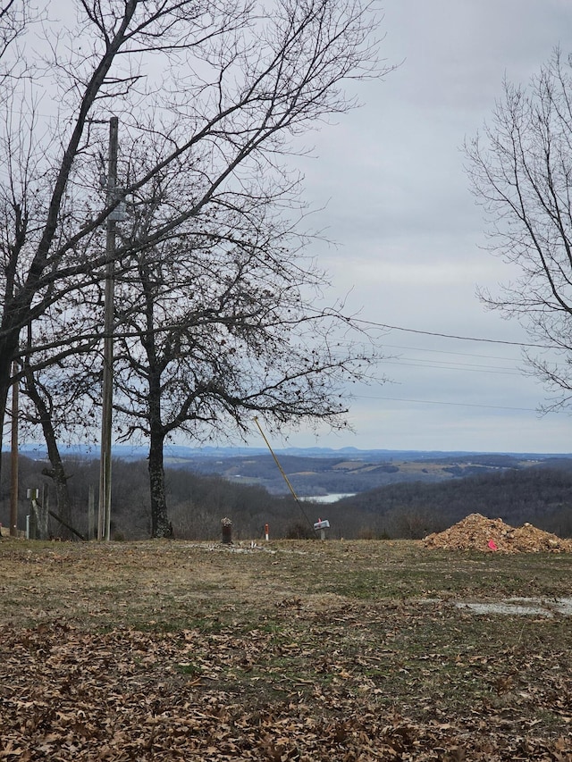 view of mountain feature with a rural view