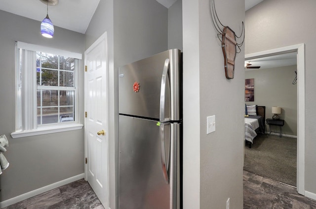 kitchen featuring stainless steel refrigerator