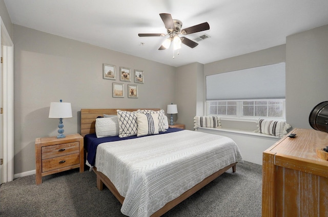 bedroom with dark carpet and ceiling fan