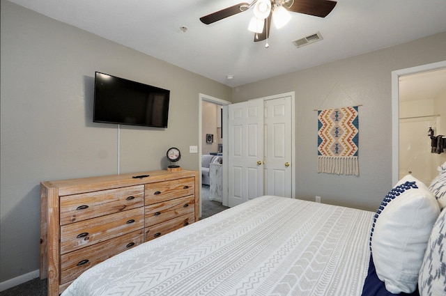 bedroom with ceiling fan and carpet floors