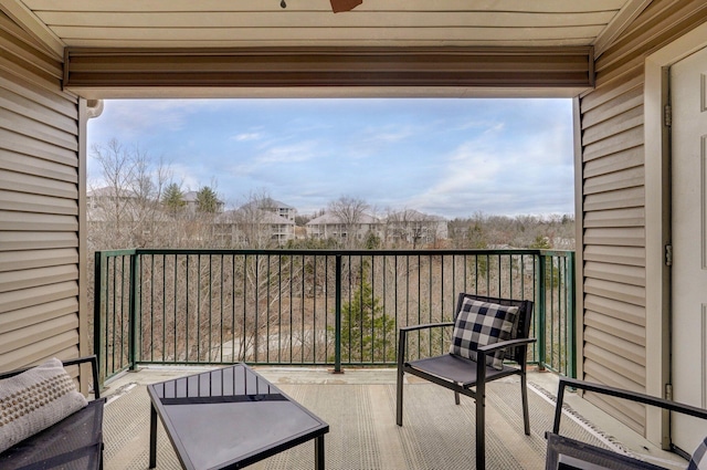 balcony featuring ceiling fan