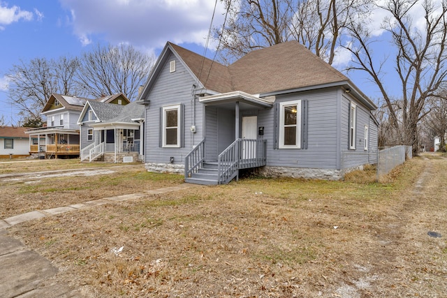 bungalow with a front lawn