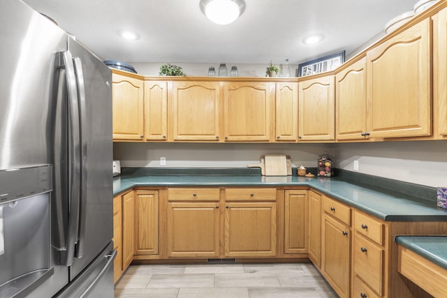 kitchen with stainless steel fridge