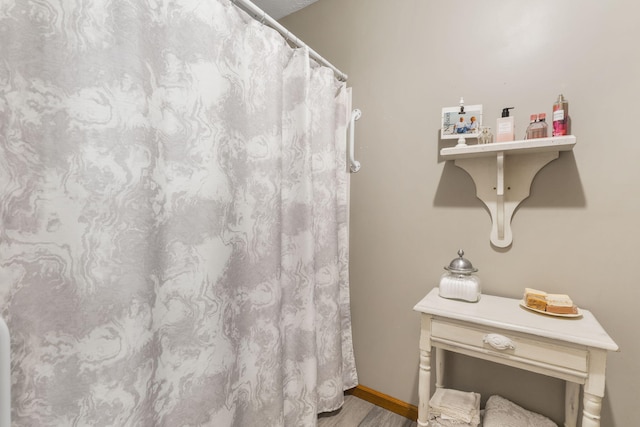 bathroom featuring hardwood / wood-style flooring