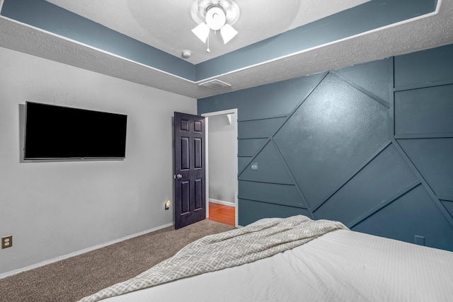 bedroom featuring ceiling fan and carpet flooring