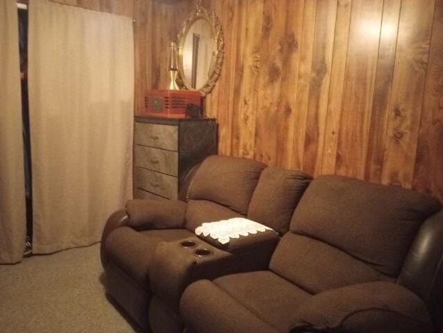 interior space featuring wooden walls