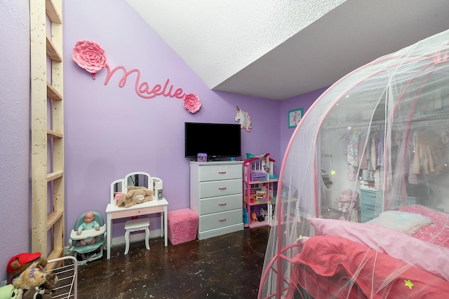 bedroom featuring lofted ceiling