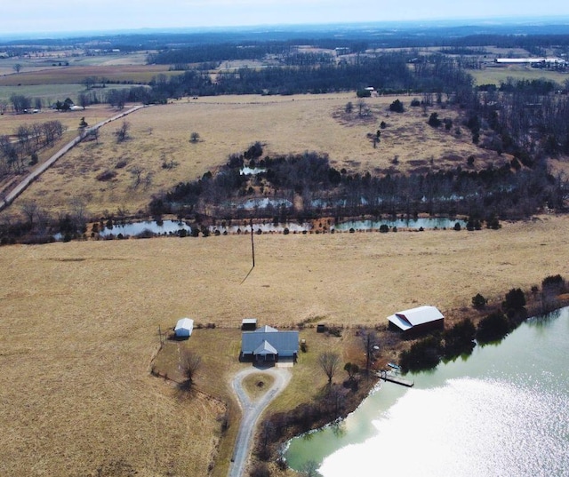 bird's eye view featuring a water view and a rural view