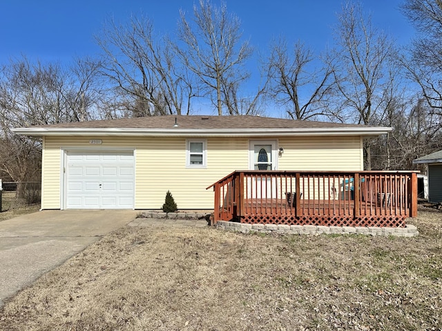 view of front facade featuring a garage and a deck