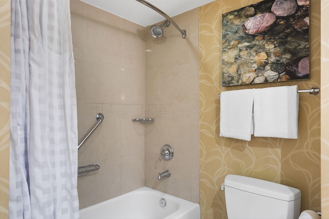 bathroom with shower / bath combination with curtain and toilet