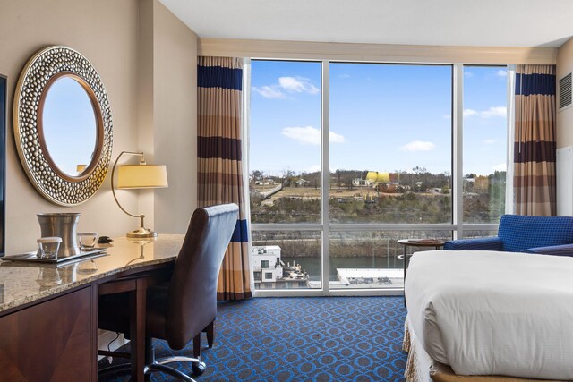 bedroom with a water view