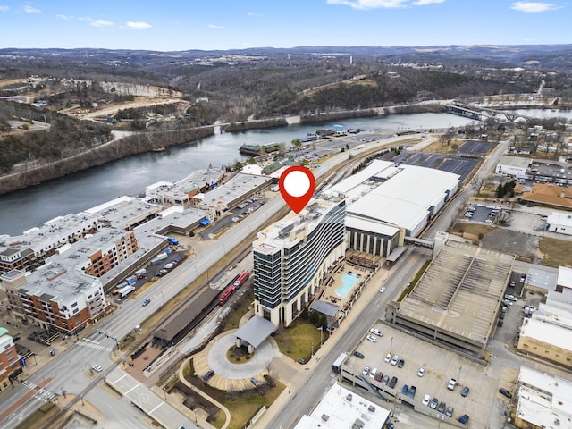 birds eye view of property with a water view