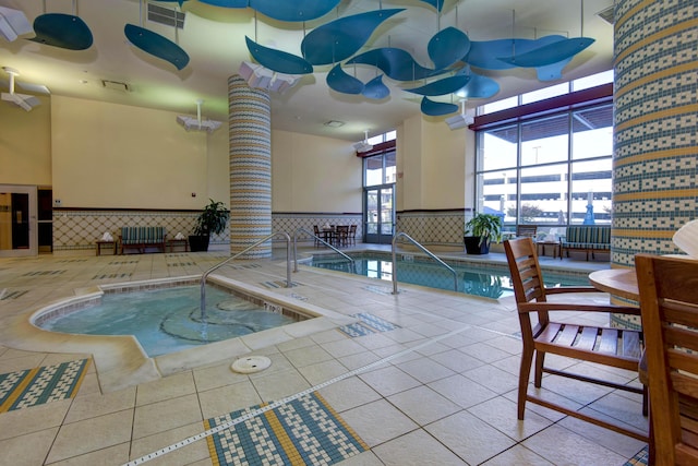 view of pool featuring an indoor hot tub