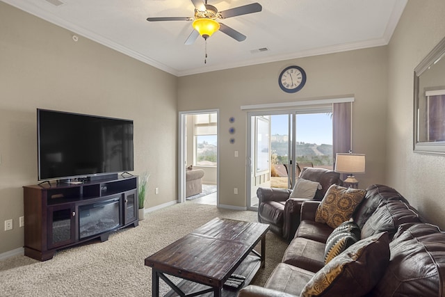 carpeted living area featuring ceiling fan, ornamental molding, visible vents, and baseboards