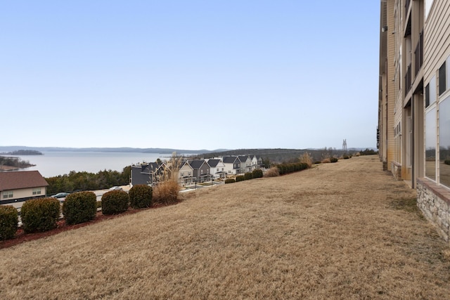 view of yard with a water view