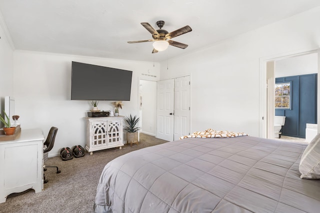 bedroom featuring crown molding, ensuite bath, ceiling fan, and carpet flooring