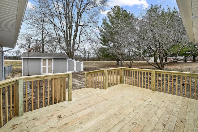 wooden deck with a storage shed