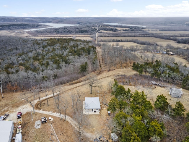 birds eye view of property with a rural view