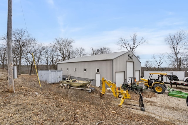 view of outdoor structure featuring a garage