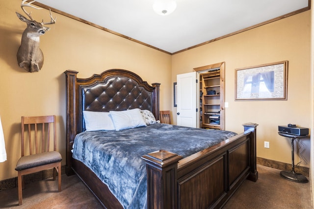 bedroom featuring ornamental molding and dark colored carpet