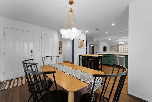 dining area with dark wood-type flooring