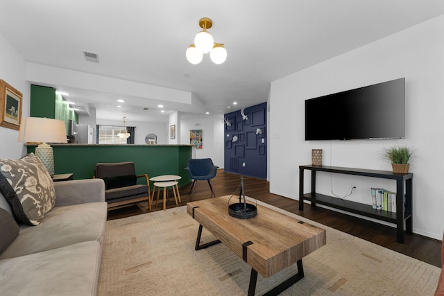 living room featuring dark hardwood / wood-style flooring