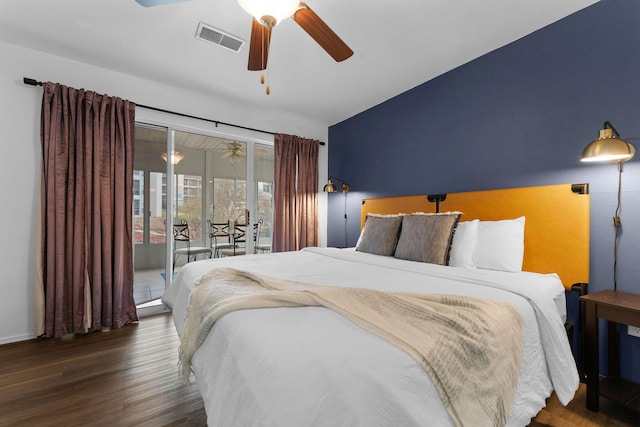 bedroom featuring lofted ceiling, dark hardwood / wood-style floors, access to outside, and ceiling fan