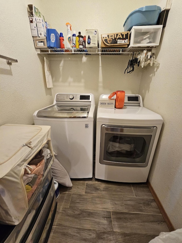 washroom with independent washer and dryer