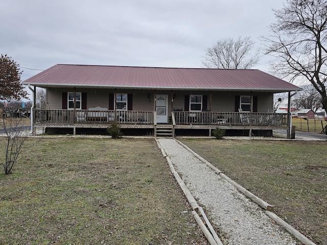 view of front of property with a front lawn and a porch