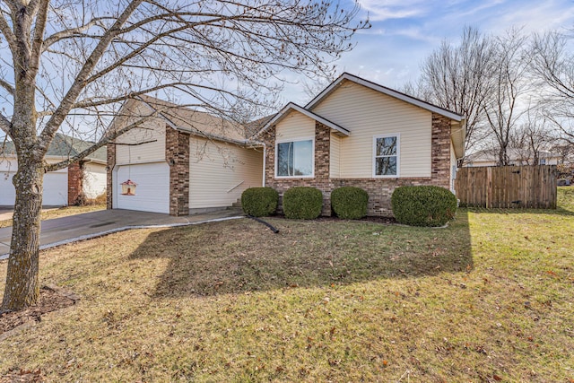 single story home with a garage and a front lawn