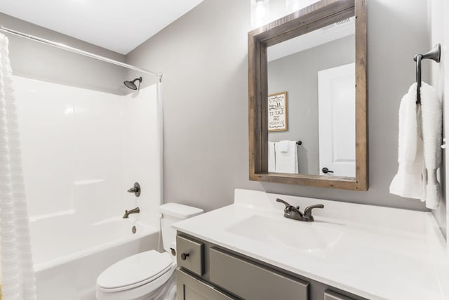 full bathroom featuring toilet, vanity, and shower / bathtub combination with curtain