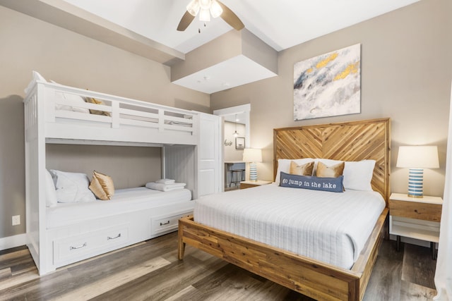 bedroom with hardwood / wood-style floors and ceiling fan