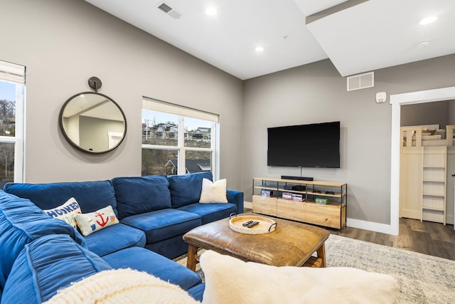 living room with dark hardwood / wood-style floors