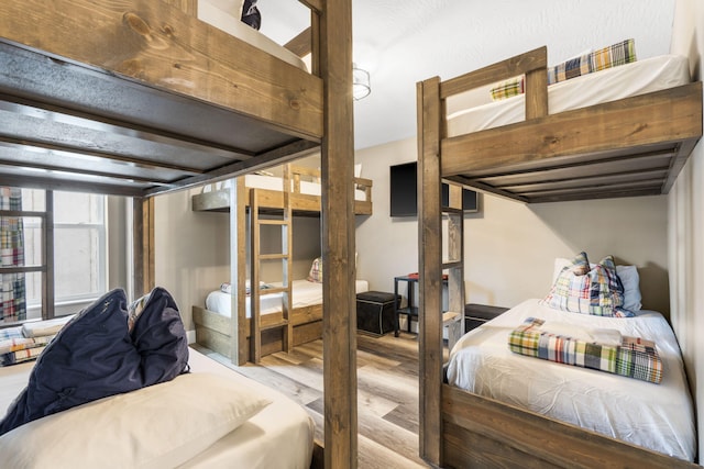 bedroom with light wood-type flooring