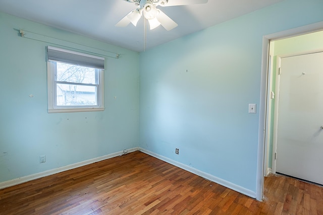 unfurnished room with wood-type flooring and ceiling fan