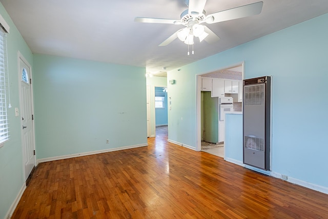 interior space featuring ceiling fan and light hardwood / wood-style flooring