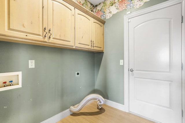 laundry area featuring washer hookup, wood-type flooring, cabinets, and hookup for an electric dryer