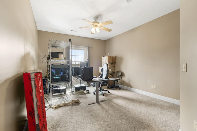 office space with carpet flooring and ceiling fan