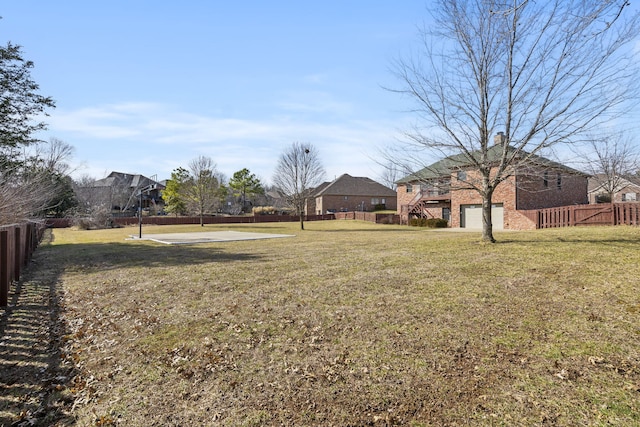 view of yard with a garage