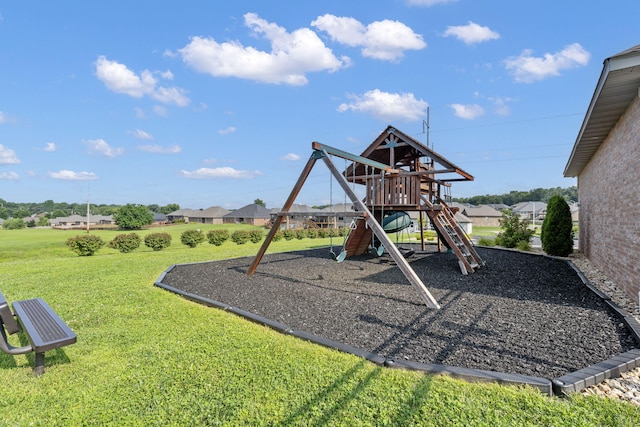 view of playground featuring a lawn