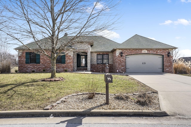 ranch-style house with a garage and a front yard