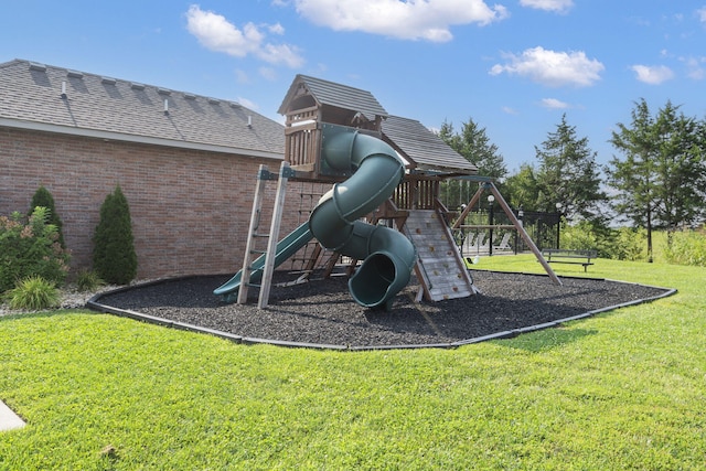 view of playground featuring a lawn