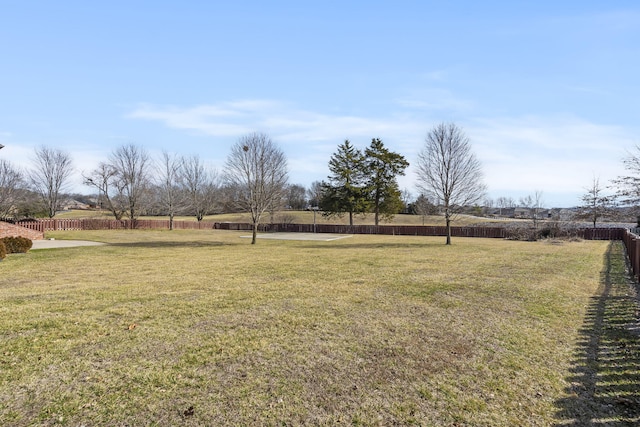 view of yard with a rural view