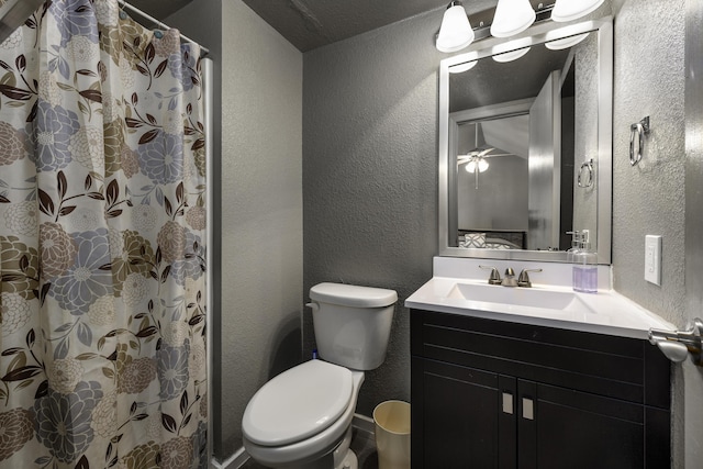 bathroom with vanity, a shower with curtain, and toilet