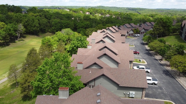1241 Golf Dr Unit 1, Branson West, MO 65737 - birds eye view of property featuring a forest view