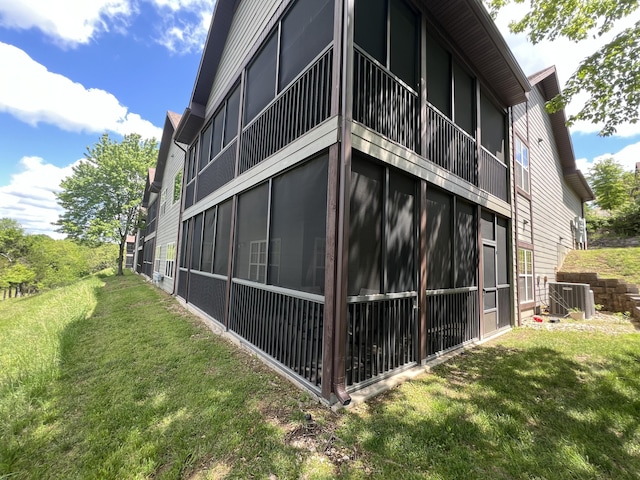 1241 Golf Dr Unit 1, Branson West, MO 65737 - view of side of property with a yard and central AC