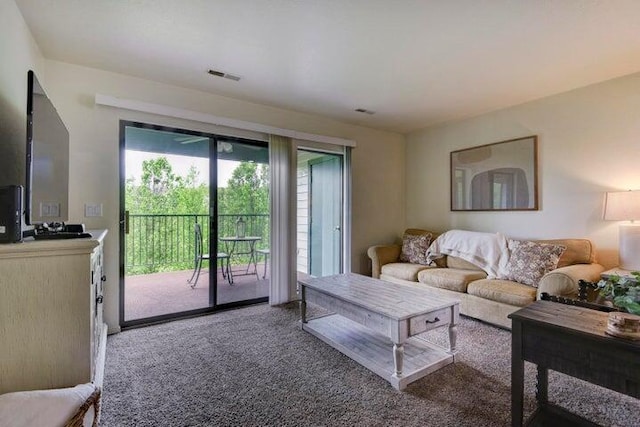 living room featuring carpet floors