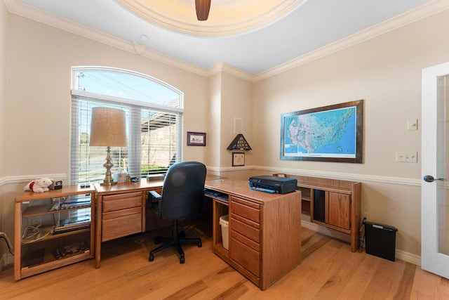 home office featuring ornamental molding and light hardwood / wood-style flooring